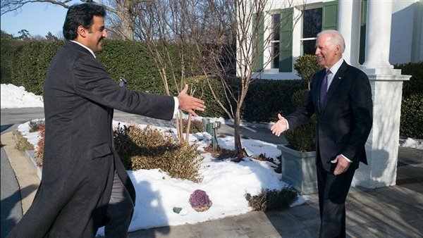 الرئيس الامريكى اثناء لقائه أمير قطر