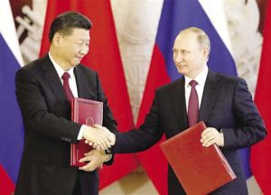 الرئيس الروسي مع نظيرة الصيني